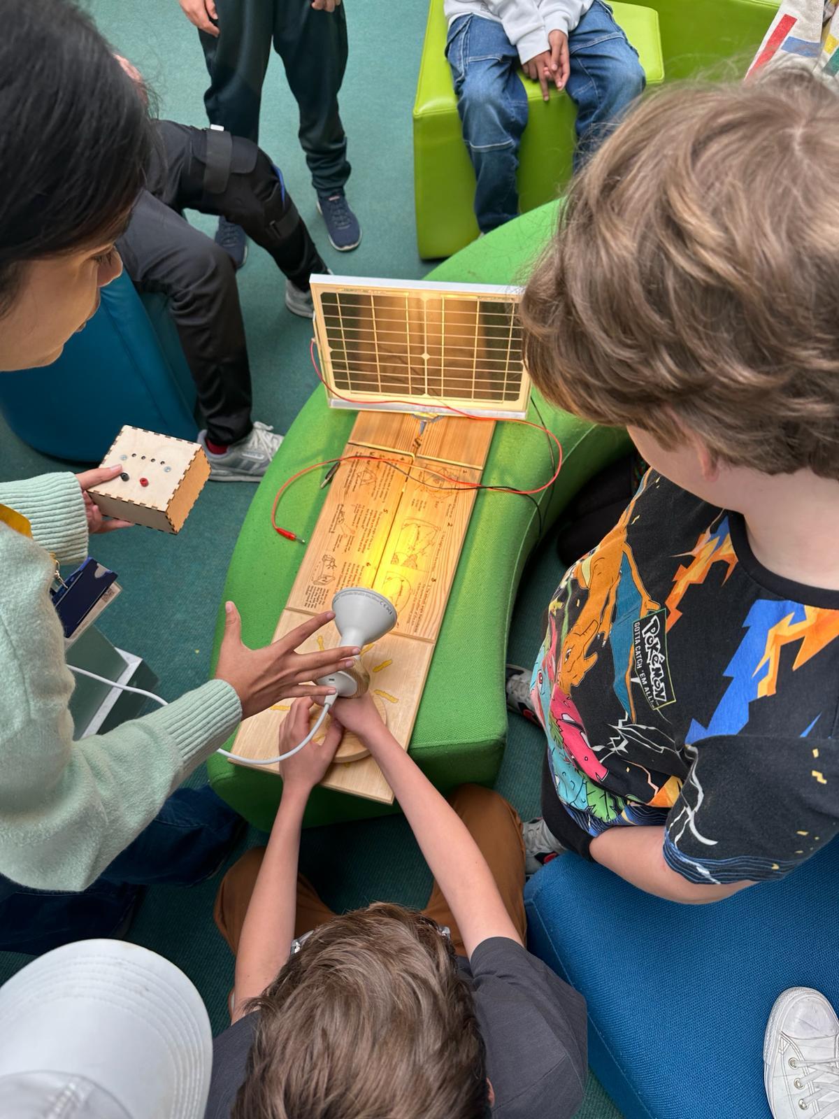 Kids experiment with a solar panel